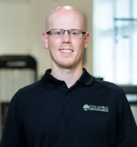 Cody Pounders business card Certified Occupational Therapist, and a Certified Hand Therapist.